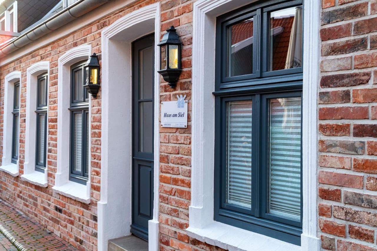 Villa Haus Am Siel 01, Zentral Mit Eigenem Steg Greetsiel Esterno foto